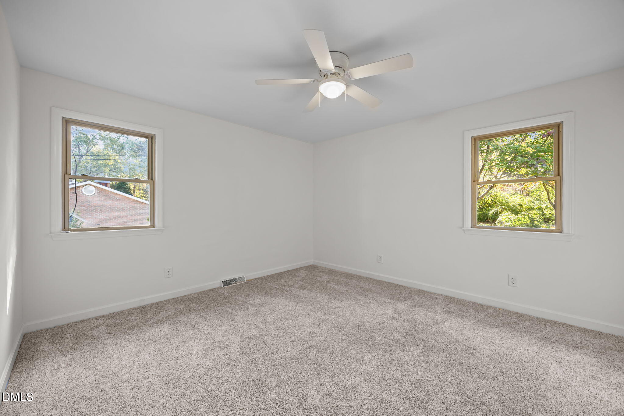 102 Royall Road Oxford, NC 27565 - Photo 22 of 53 a view of an empty room with a window