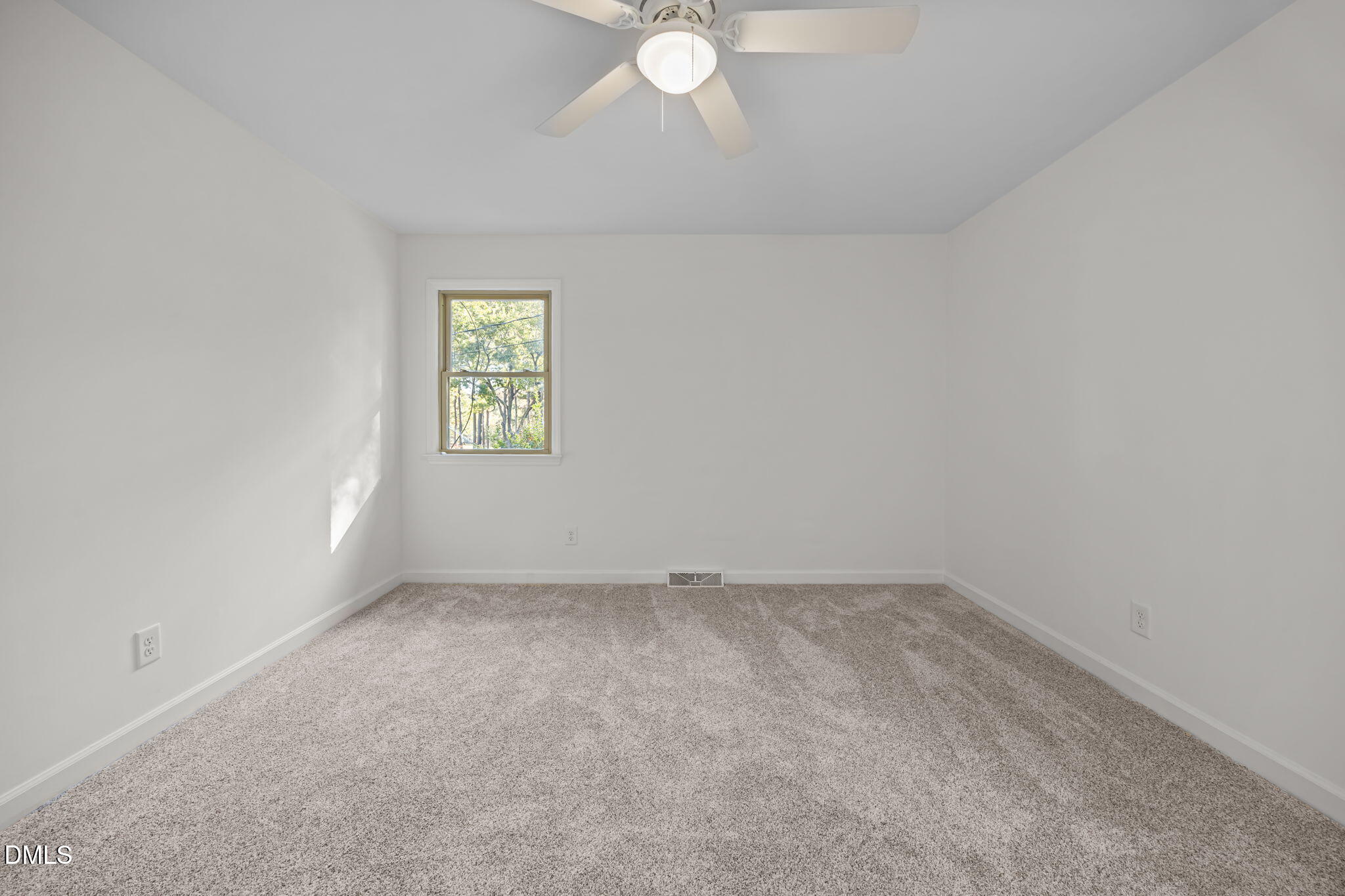 102 Royall Road Oxford, NC 27565 - Photo 28 of 53 an empty room with a window