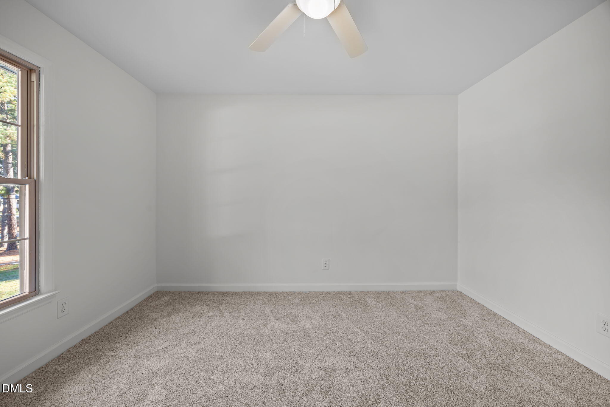 102 Royall Road Oxford, NC 27565 - Photo 30 of 53 an empty room with a window