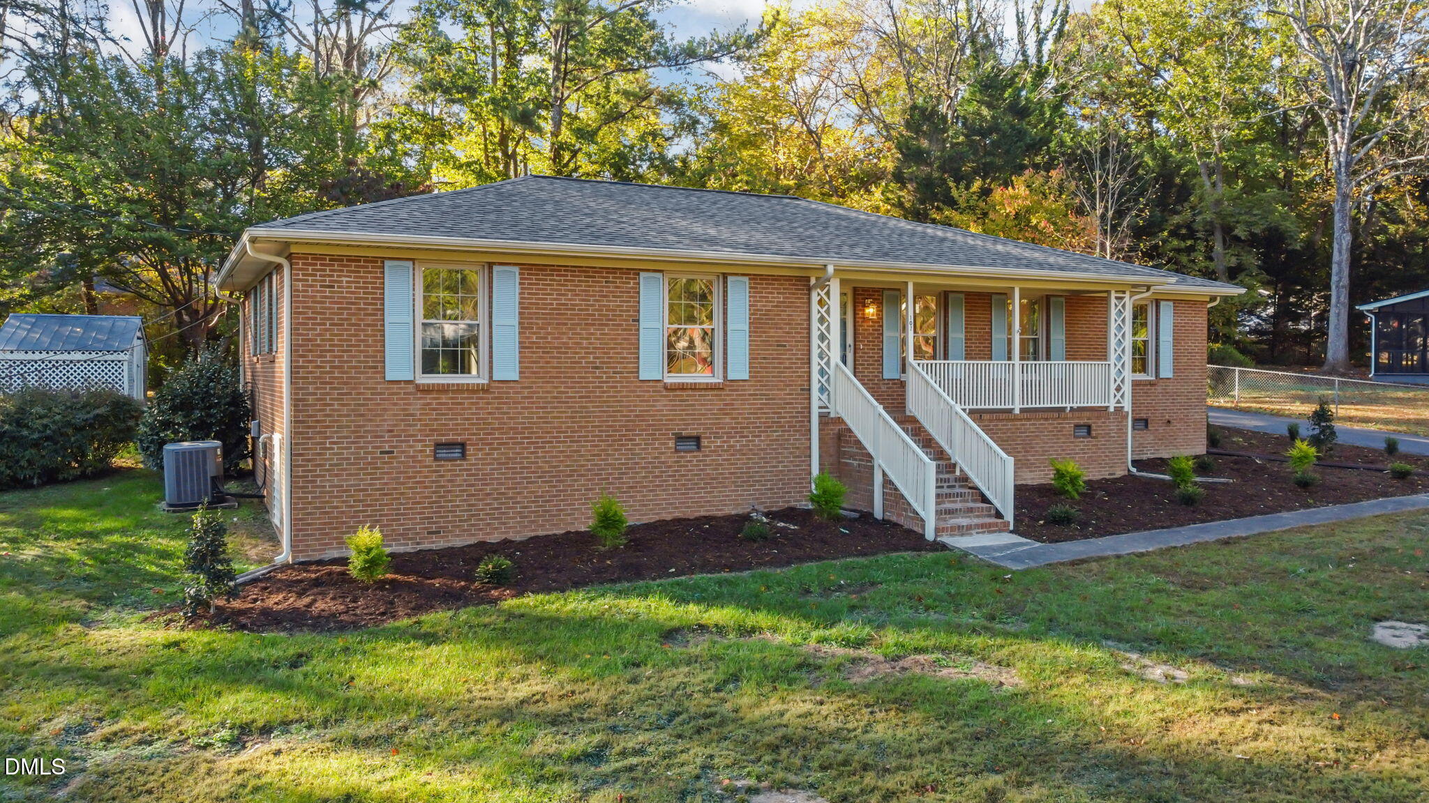 102 Royall Road Oxford, NC 27565 - Photo 36 of 53 a view of a house with a yard and sitting area