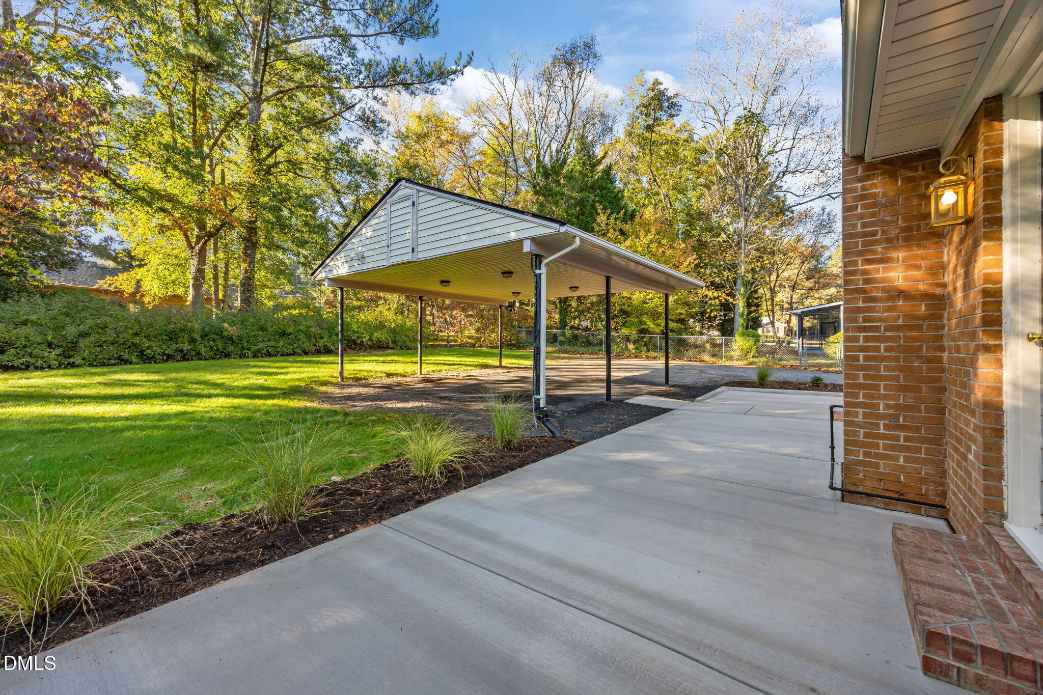 102 Royall Road Oxford, NC 27565 - Photo 46 of 53 a view of a house with backyard and a tree
