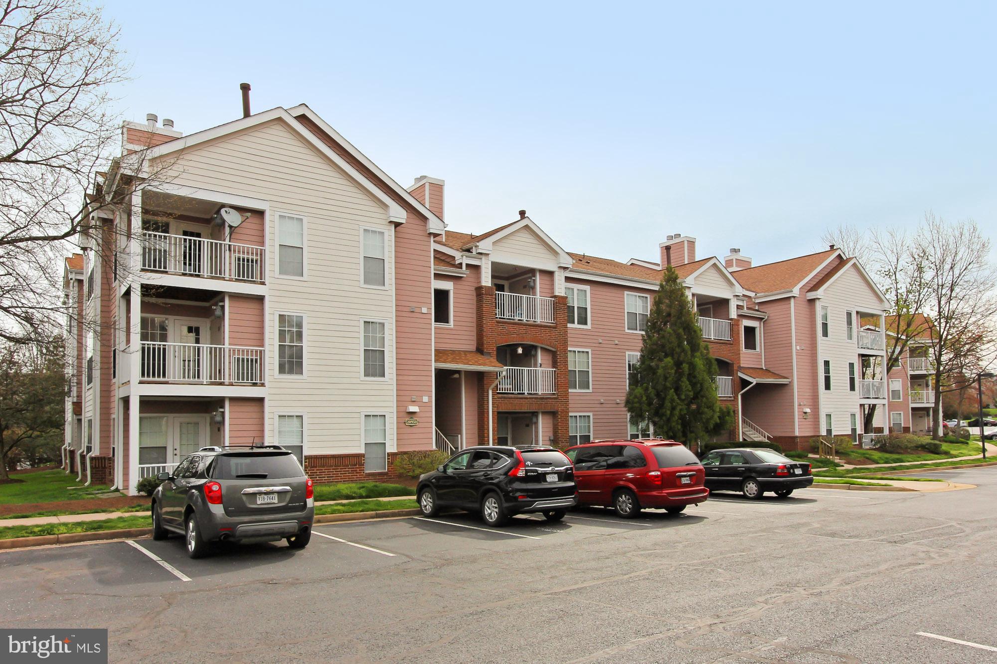 20950 Timber Ridge Terrace, Unit 201 Ashburn, VA 20147 - Photo 2 of 37 Front View. Ample Parking
