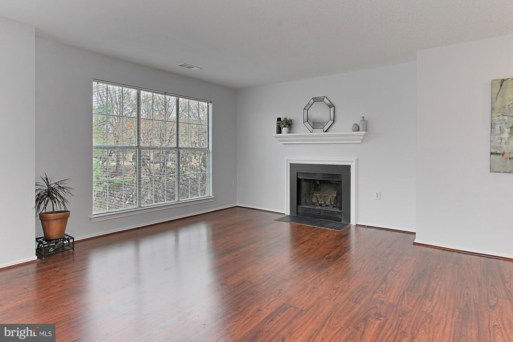 20950 Timber Ridge Terrace, Unit 201 Ashburn, VA 20147 - Photo 13 of 37 Oversized windows throughout the unit