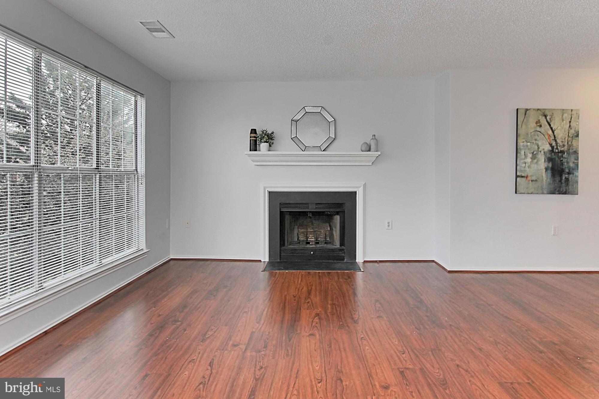 20950 Timber Ridge Terrace, Unit 201 Ashburn, VA 20147 - Photo 14 of 37 Living Room