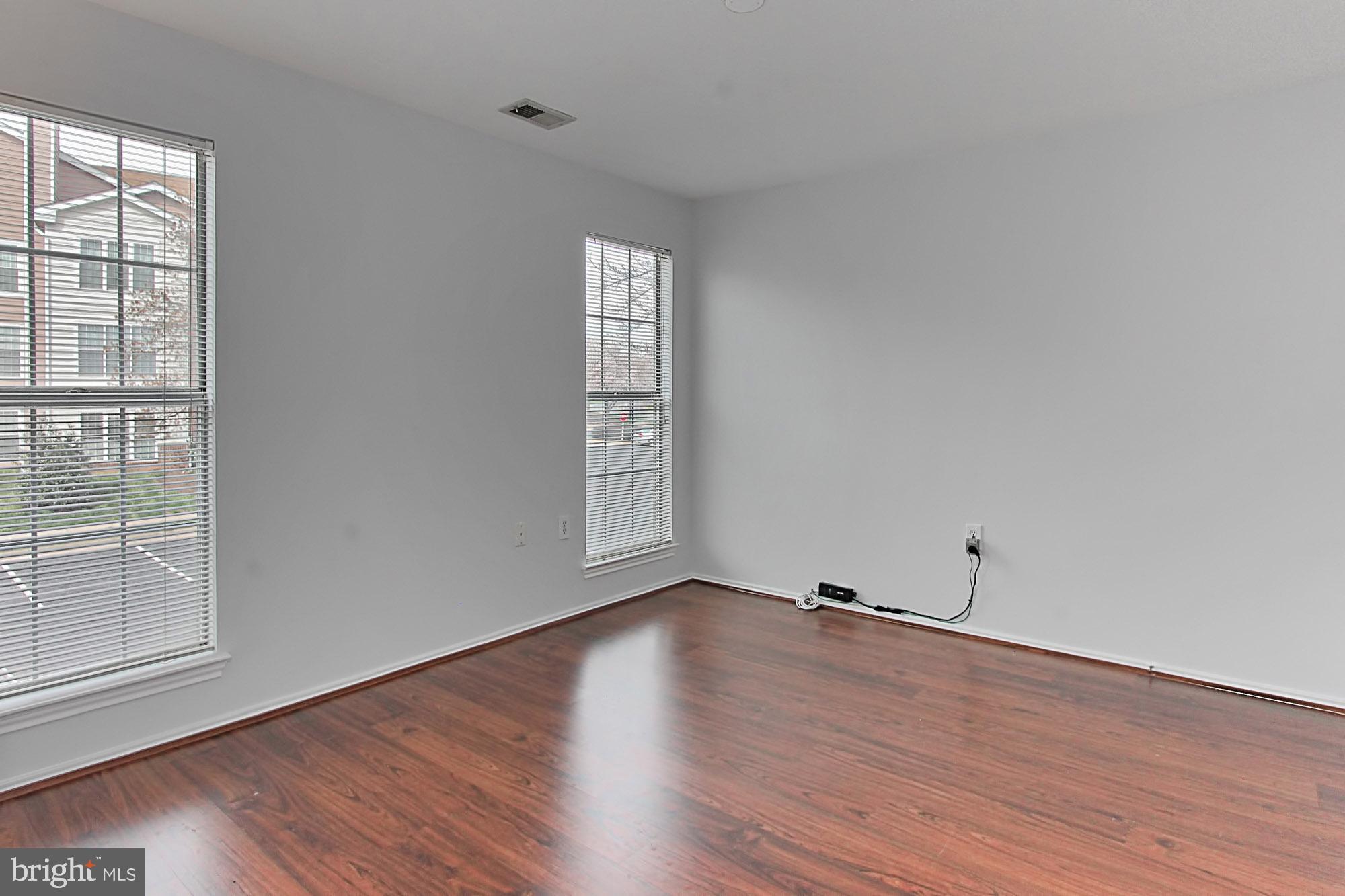 20950 Timber Ridge Terrace, Unit 201 Ashburn, VA 20147 - Photo 24 of 37 Master Bedroom with oversized windows