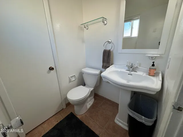 a bathroom with a sink and a toilet