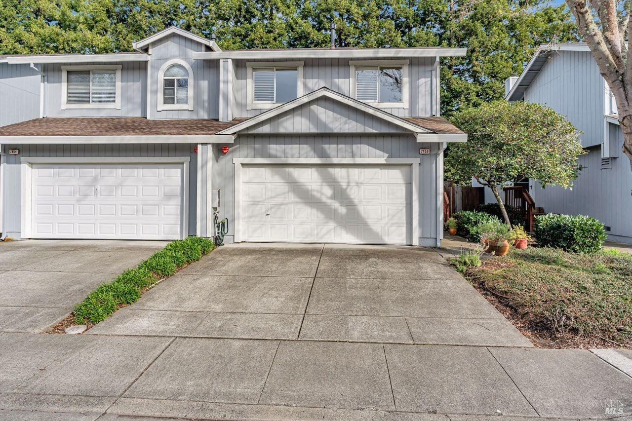 7456 Madera Place Rohnert Park, CA 94928 - Photo 1 of 1 a front view of a house with a yard and garage