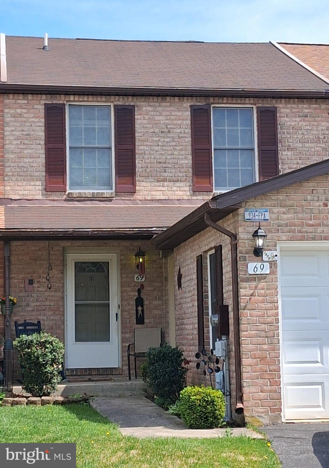 69 Johnson Smithsburg, MD 21783 - Photo 1 of 39 a front view of a house with garden