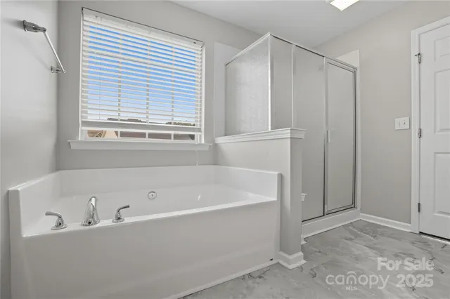 a view of a room that has a window in it