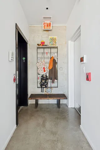 a kitchen with cabinets and window