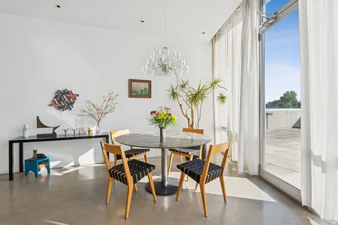 a bedroom with a bed and walk in closet