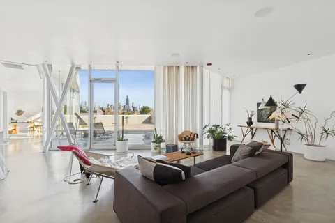 a living room with furniture and a table
