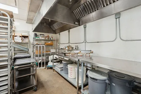 a view of a building with a street