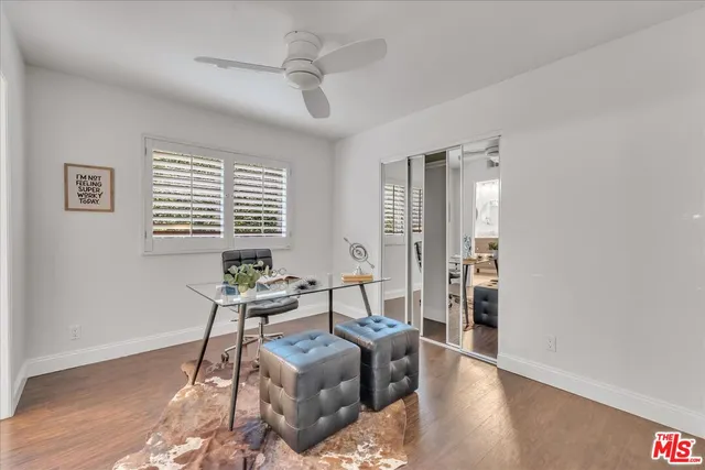 a work room with furniture and windows