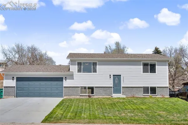 a front view of house with yard