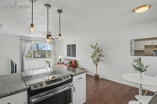 a living room with furniture and a table
