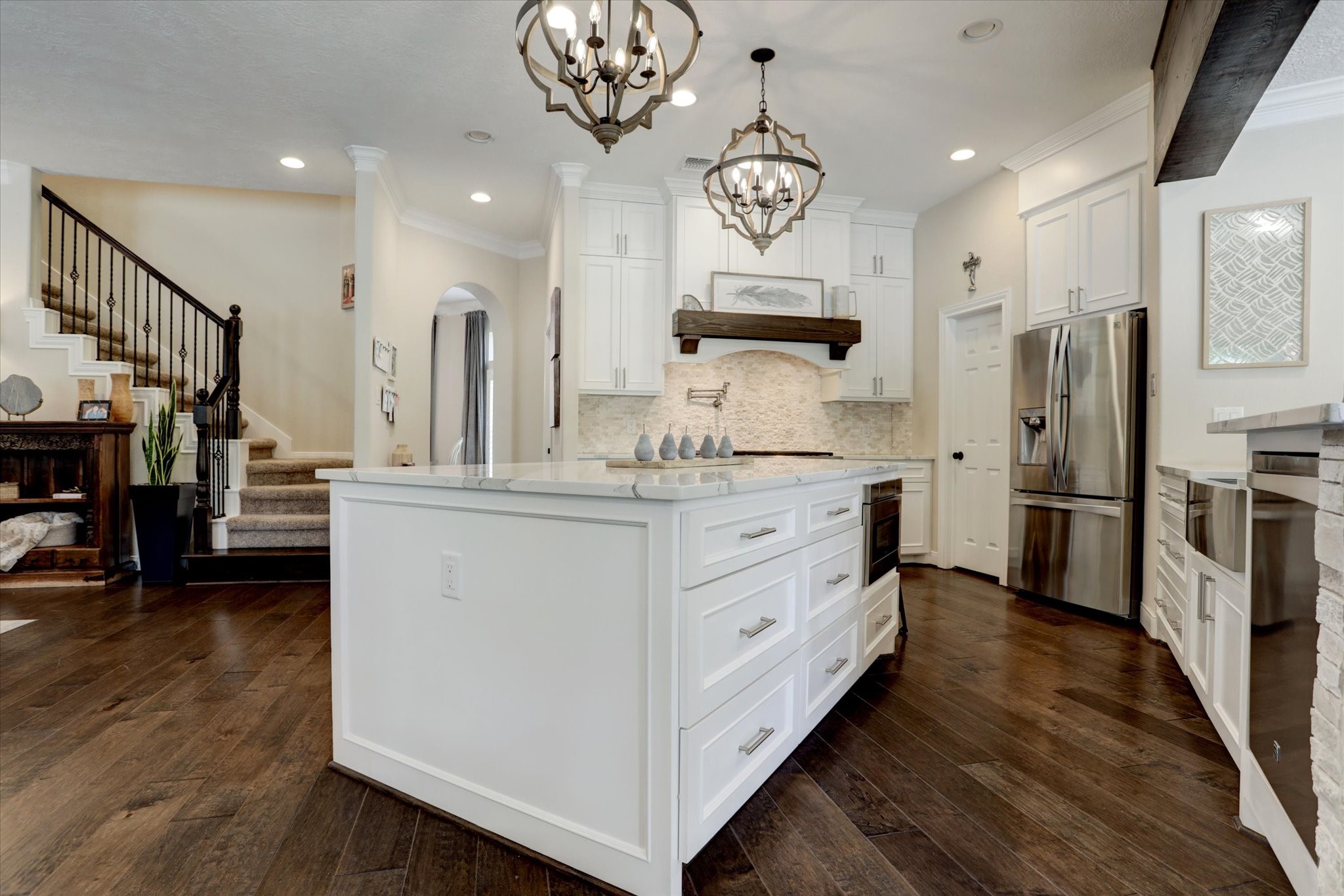 2904 Bridle Path Lane Friendswood, TX 77546 - Photo 18 of 49 a bathroom with a sink a mirror and a shower
