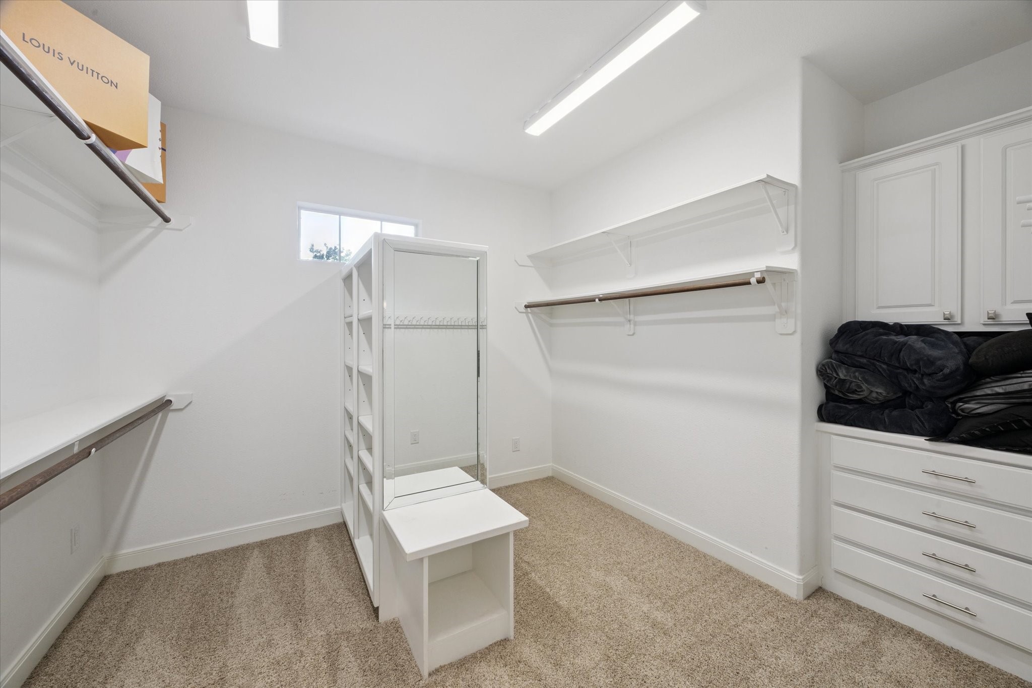 2904 Bridle Path Lane Friendswood, TX 77546 - Photo 24 of 49 One of TWO generously sized walk-in closets, offering ample hanging space, built-in shelving, and organized storage for everything from seasonal wardrobes to accessories.