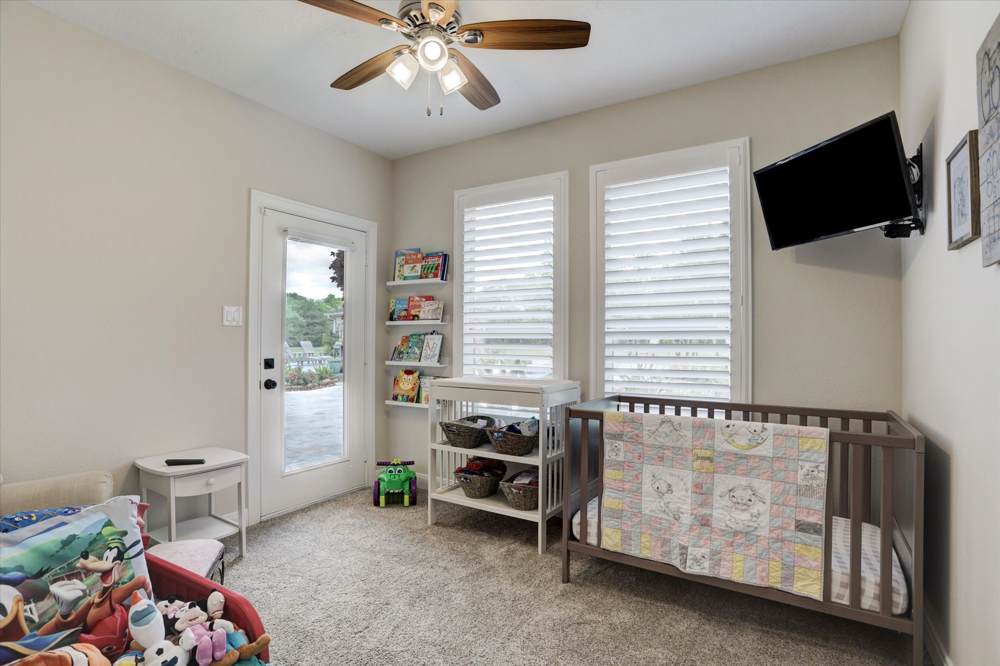 2904 Bridle Path Lane Friendswood, TX 77546 - Photo 27 of 49 a view of a livingroom with furniture and a flat screen tv