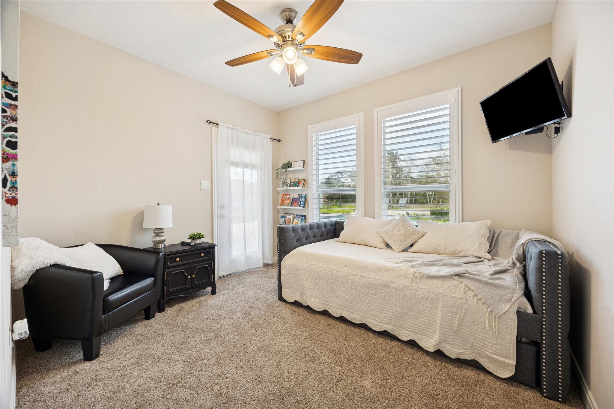 2904 Bridle Path Lane Friendswood, TX 77546 - Photo 28 of 49 a bedroom with bed tv and window