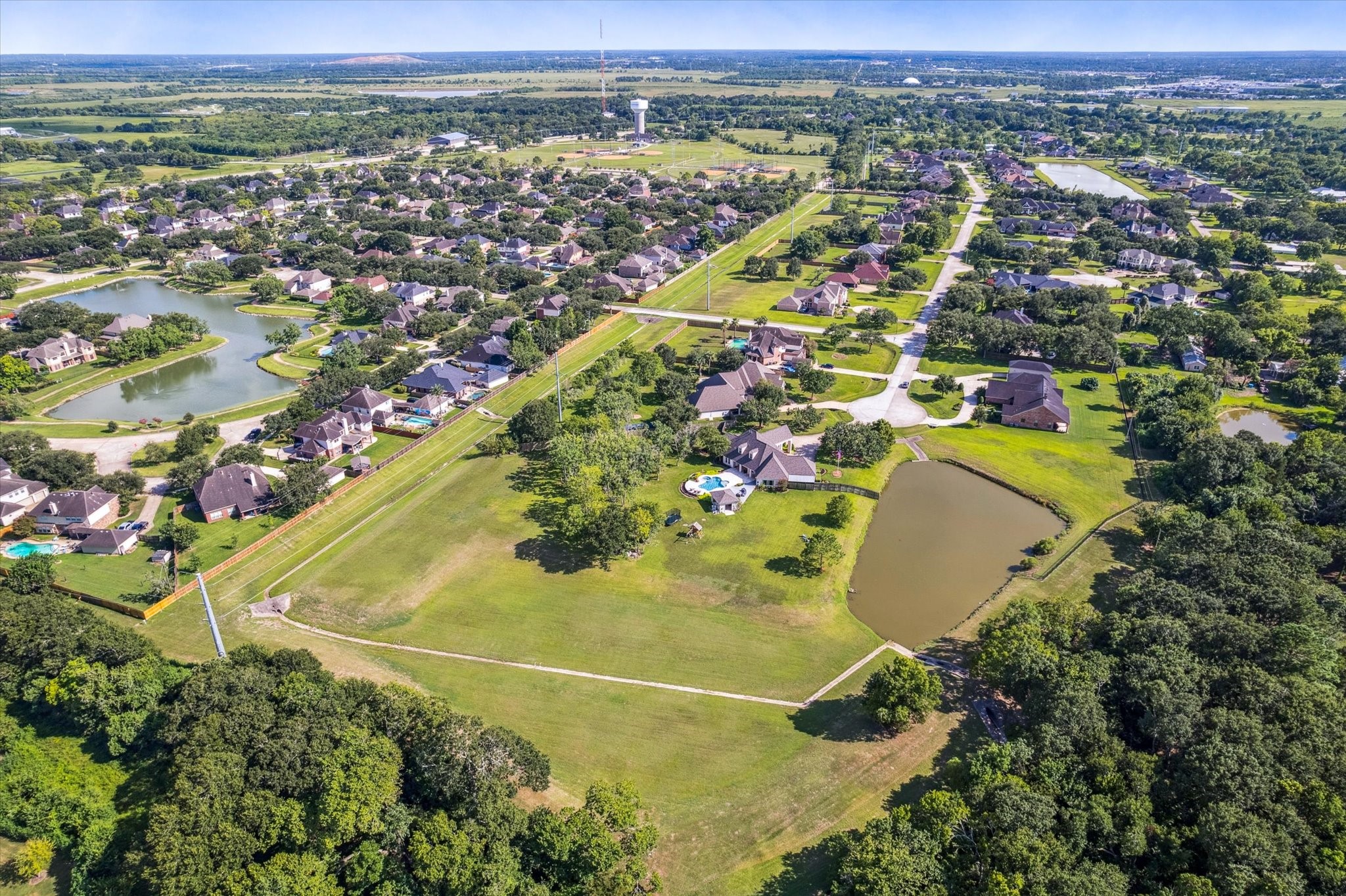 2904 Bridle Path Lane Friendswood, TX 77546 - Photo 48 of 49 an aerial view of a residential houses with outdoor space and trees