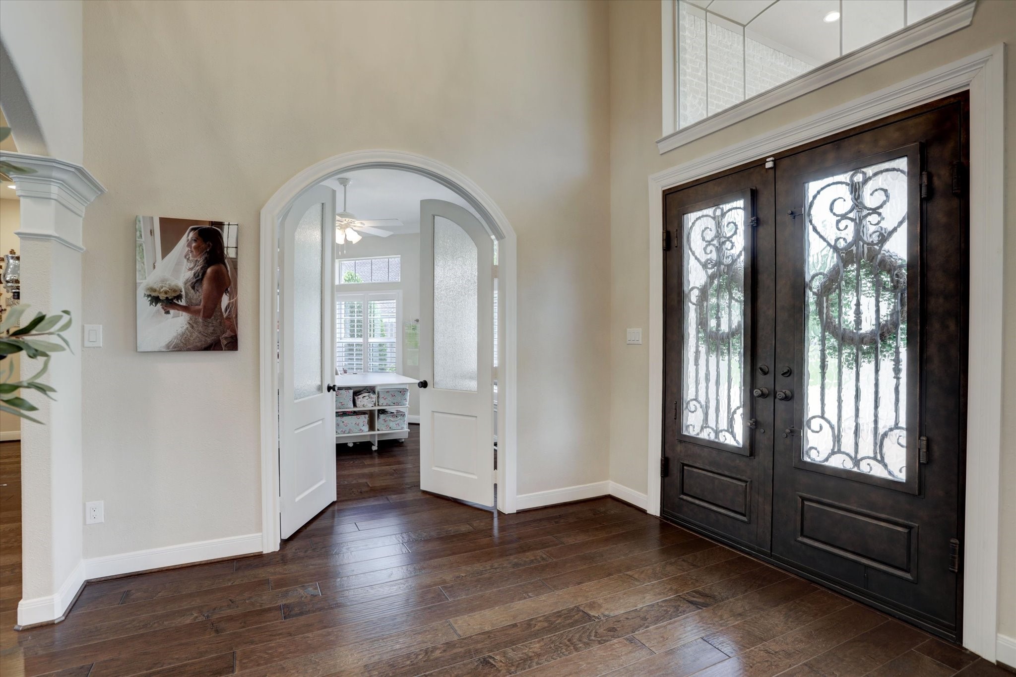 2904 Bridle Path Lane Friendswood, TX 77546 - Photo 6 of 49 To the left, a set of beautiful arched doors opens into the private office.