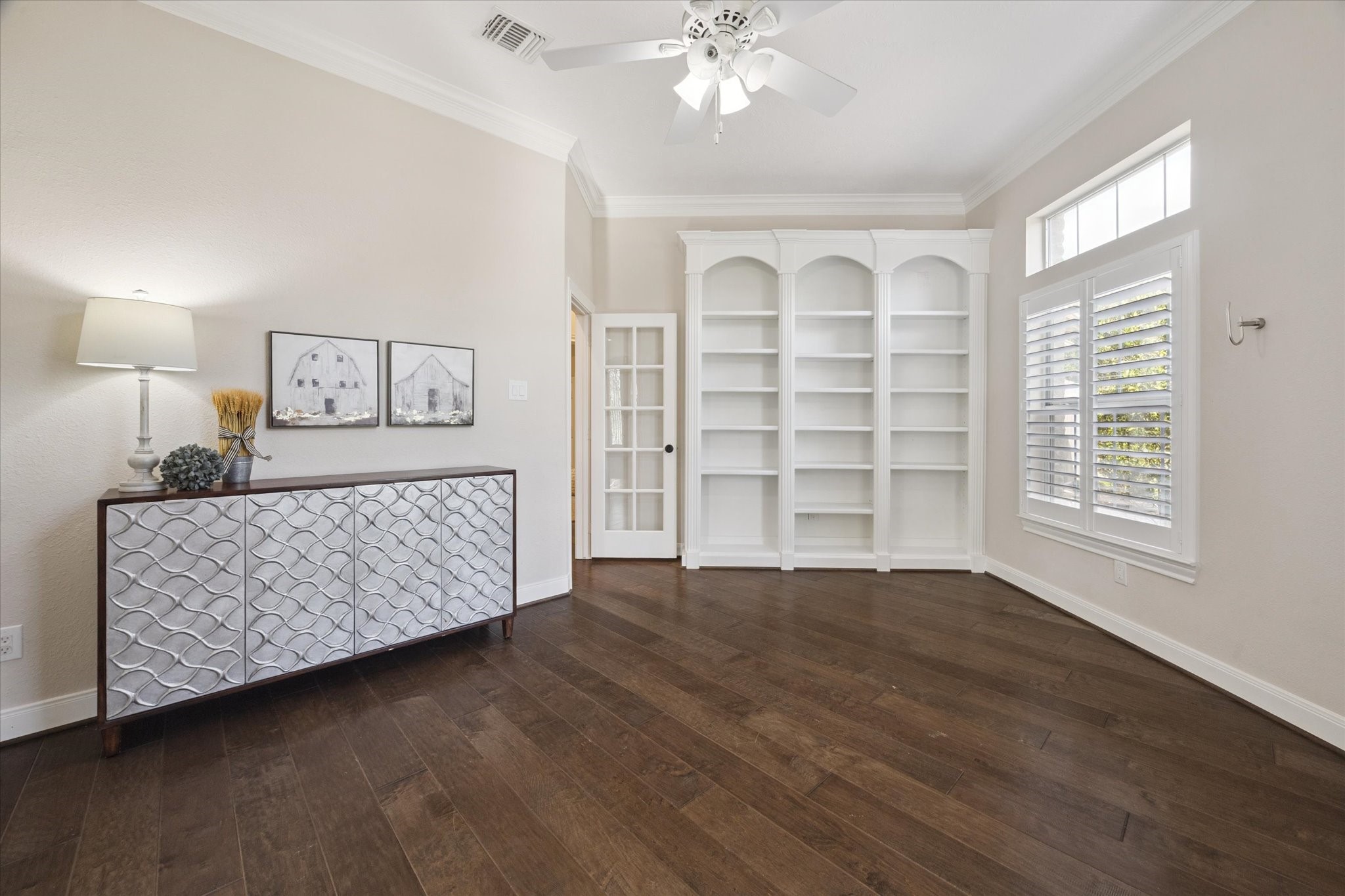 2904 Bridle Path Lane Friendswood, TX 77546 - Photo 7 of 49 The functional office/study features soaring ceilings, built-ins, and a private door that leads to the hallway connecting to the half bathroom and spacious primary suite.
