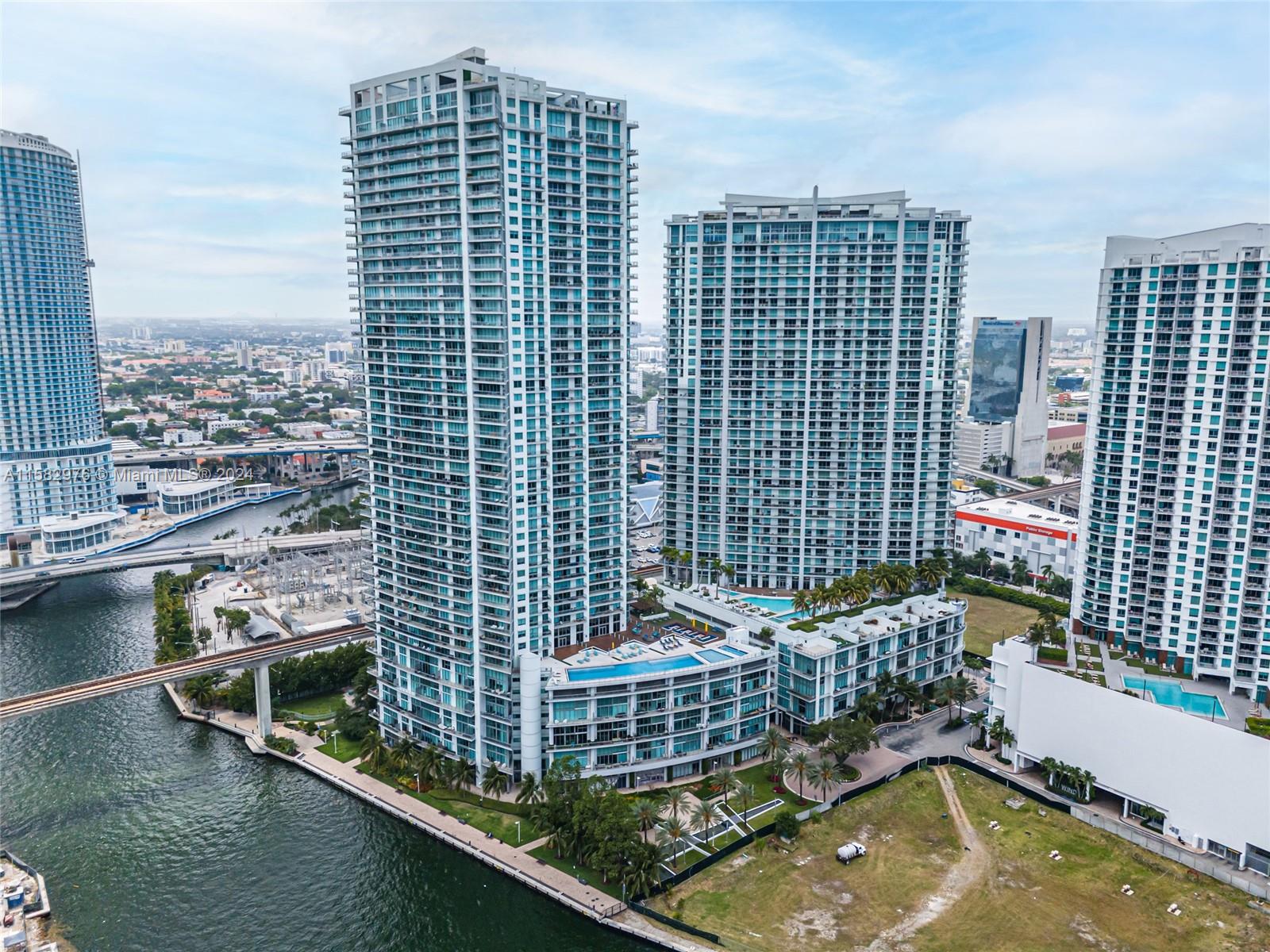 92 Southwest 3rd Street, Unit 2303 Miami, FL 33130 - Photo 32 of 35 a view of roof deck with a barbeque grill and city view