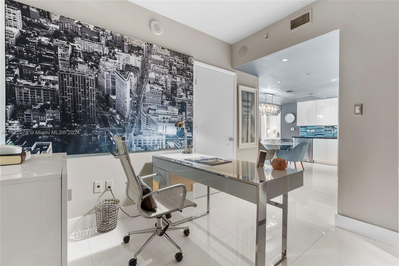 92 Southwest 3rd Street, Unit 2303 Miami, FL 33130 - Photo 7 of 35 a view of a workspace and kitchen area