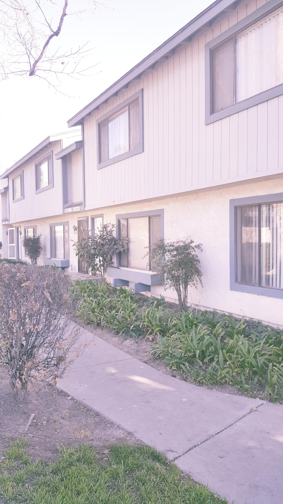 2047 East Bard Road Oxnard, CA 93033 - Photo 2 of 25 a front view of a house with garden
