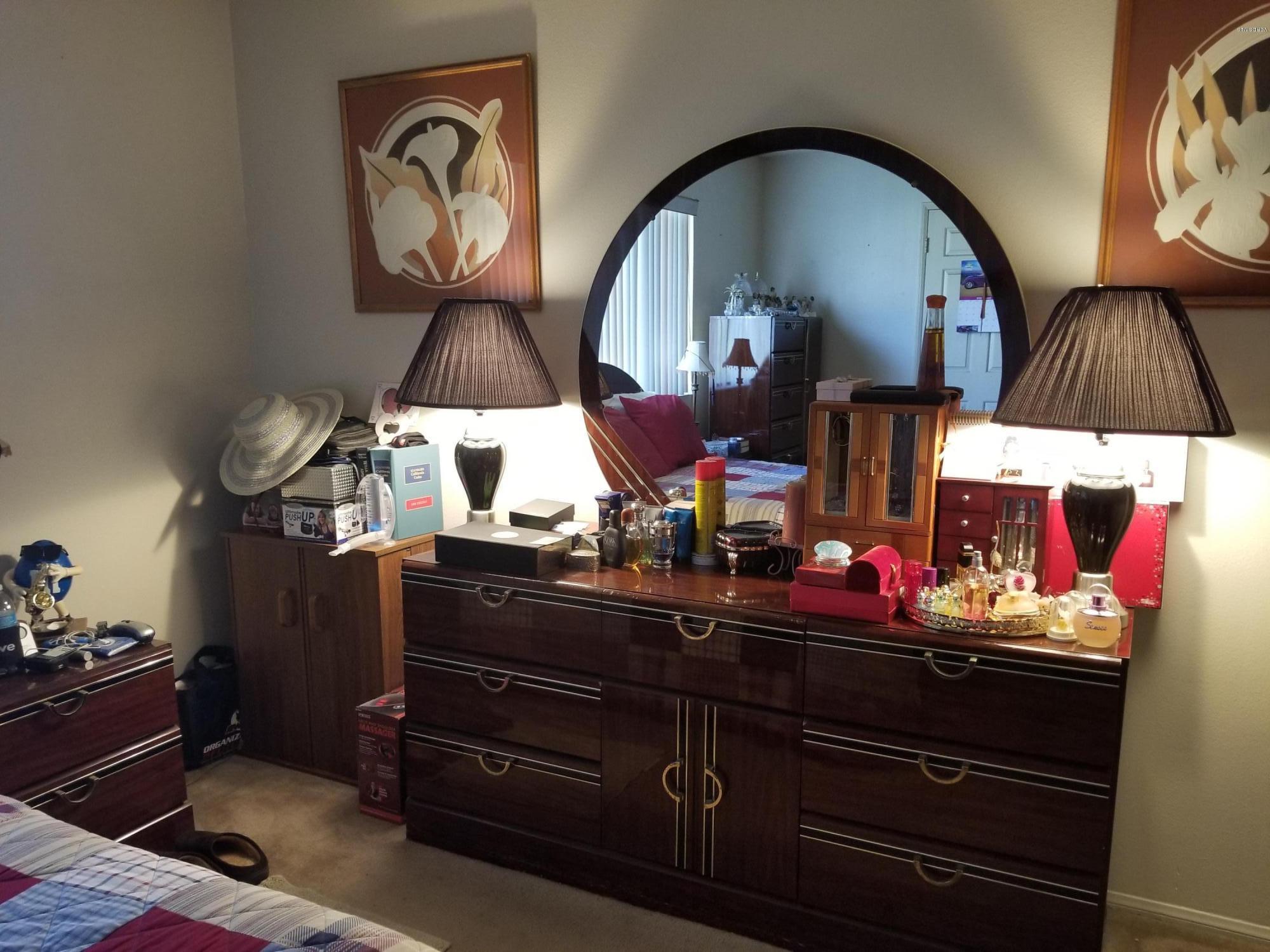2047 East Bard Road Oxnard, CA 93033 - Photo 13 of 25 a room with furniture and wooden floor