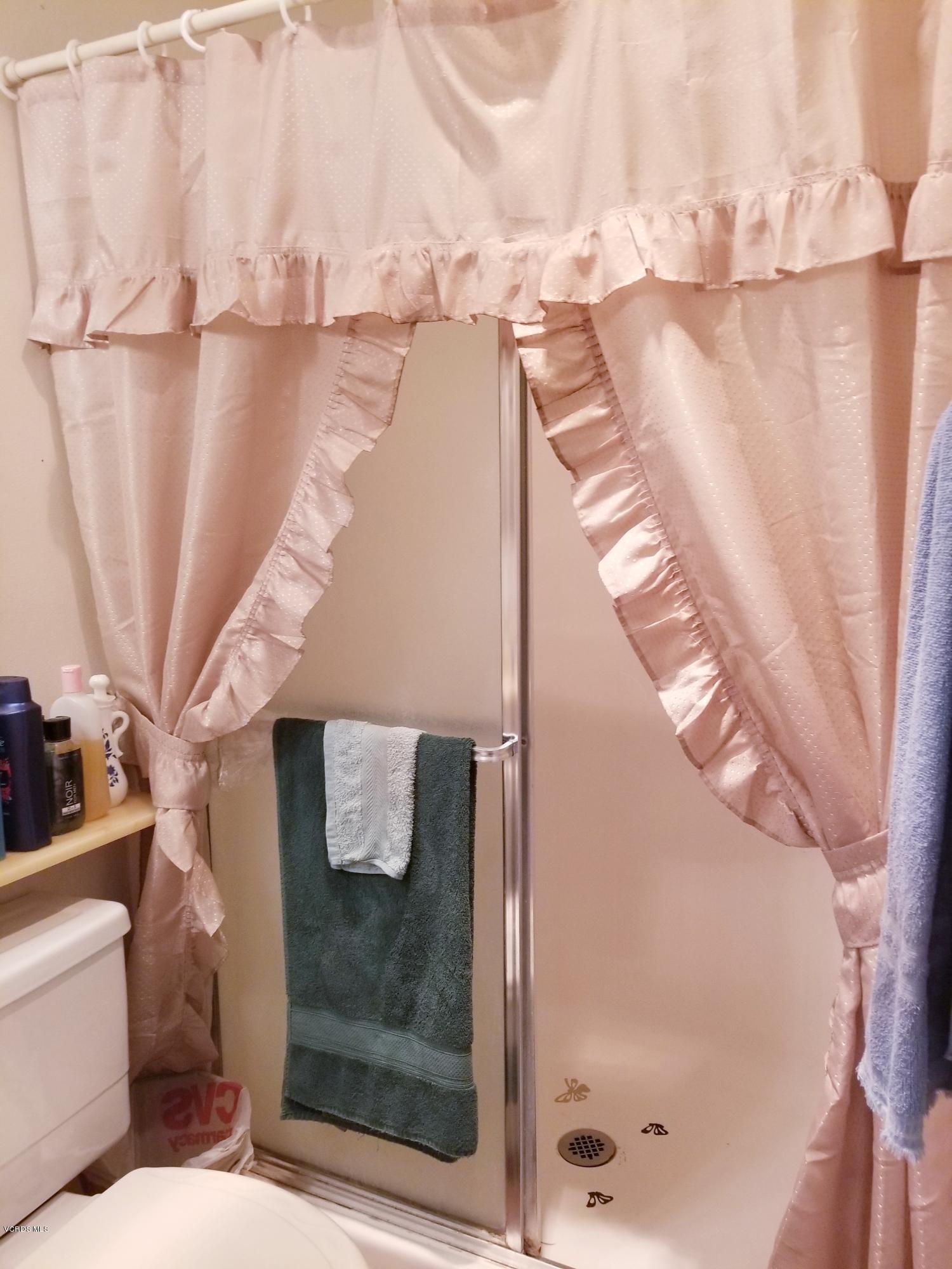 2047 East Bard Road Oxnard, CA 93033 - Photo 16 of 25 a bathroom with a shower