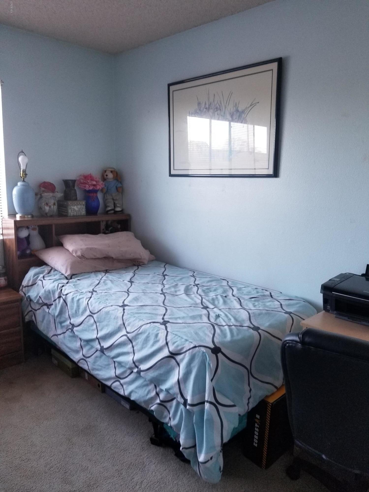 2047 East Bard Road Oxnard, CA 93033 - Photo 19 of 25 a bedroom with a bed and window
