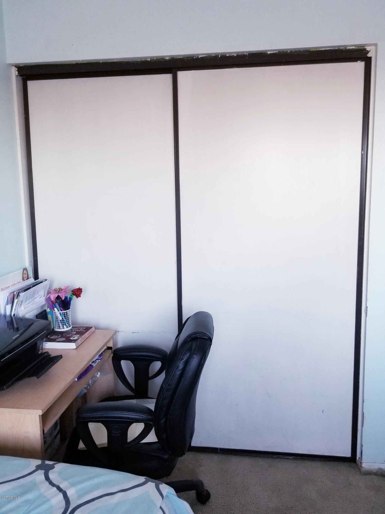 2047 East Bard Road Oxnard, CA 93033 - Photo 20 of 25 a view of a room with furniture and a gate