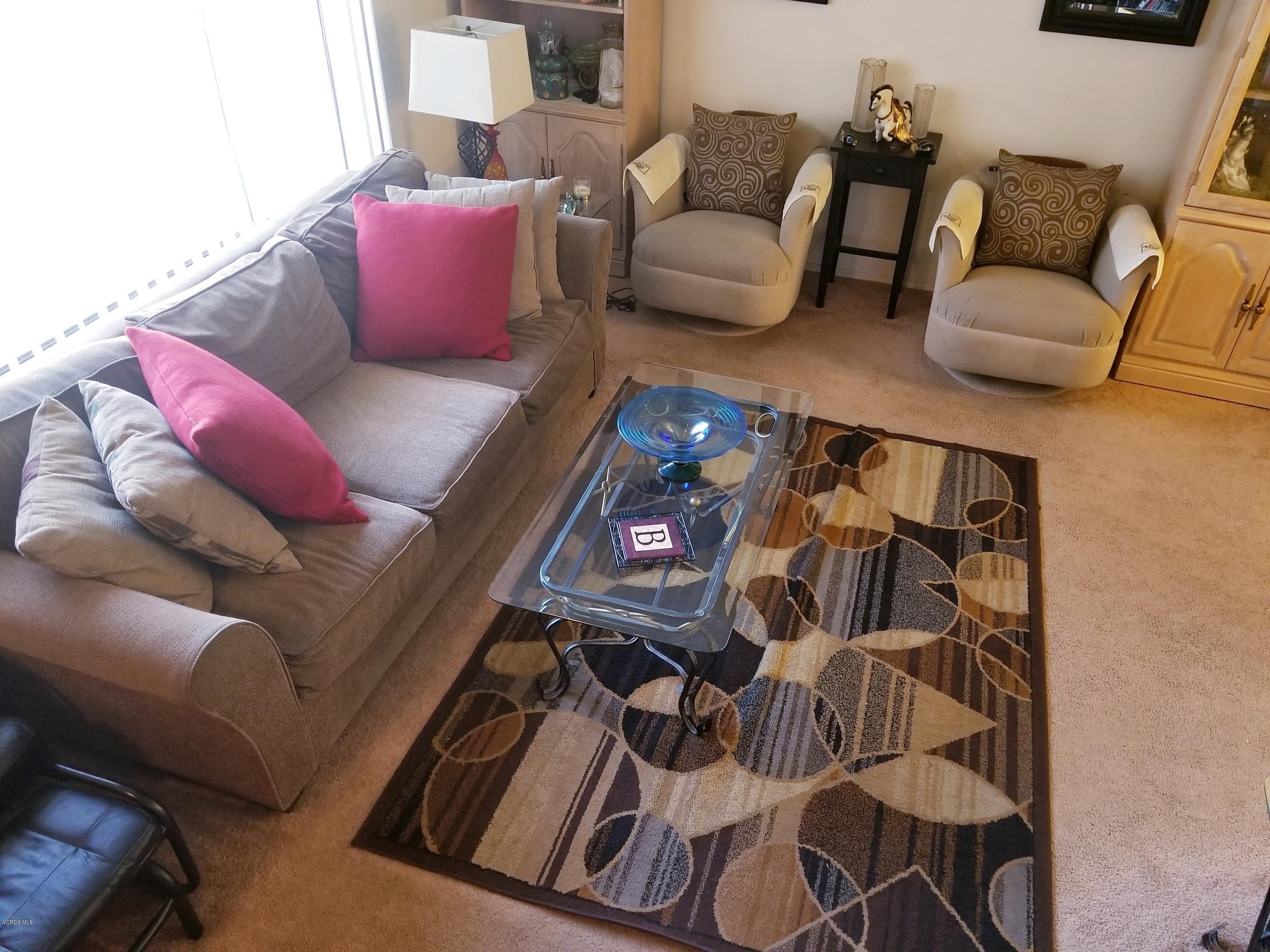2047 East Bard Road Oxnard, CA 93033 - Photo 5 of 25 a living room with furniture and a couch