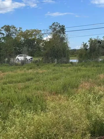 a view of outdoor space and yard
