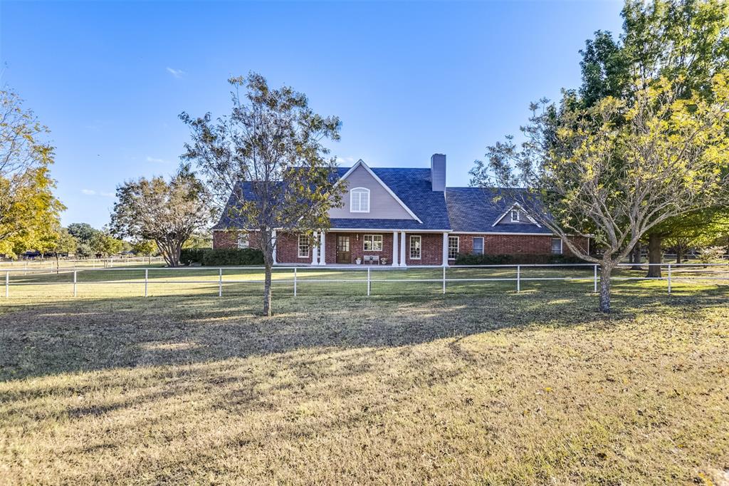350 Turner Warnell Road Mansfield, TX 76063 - Photo 1 of 1 View of front of house with a porch, brick siding, and a chimney