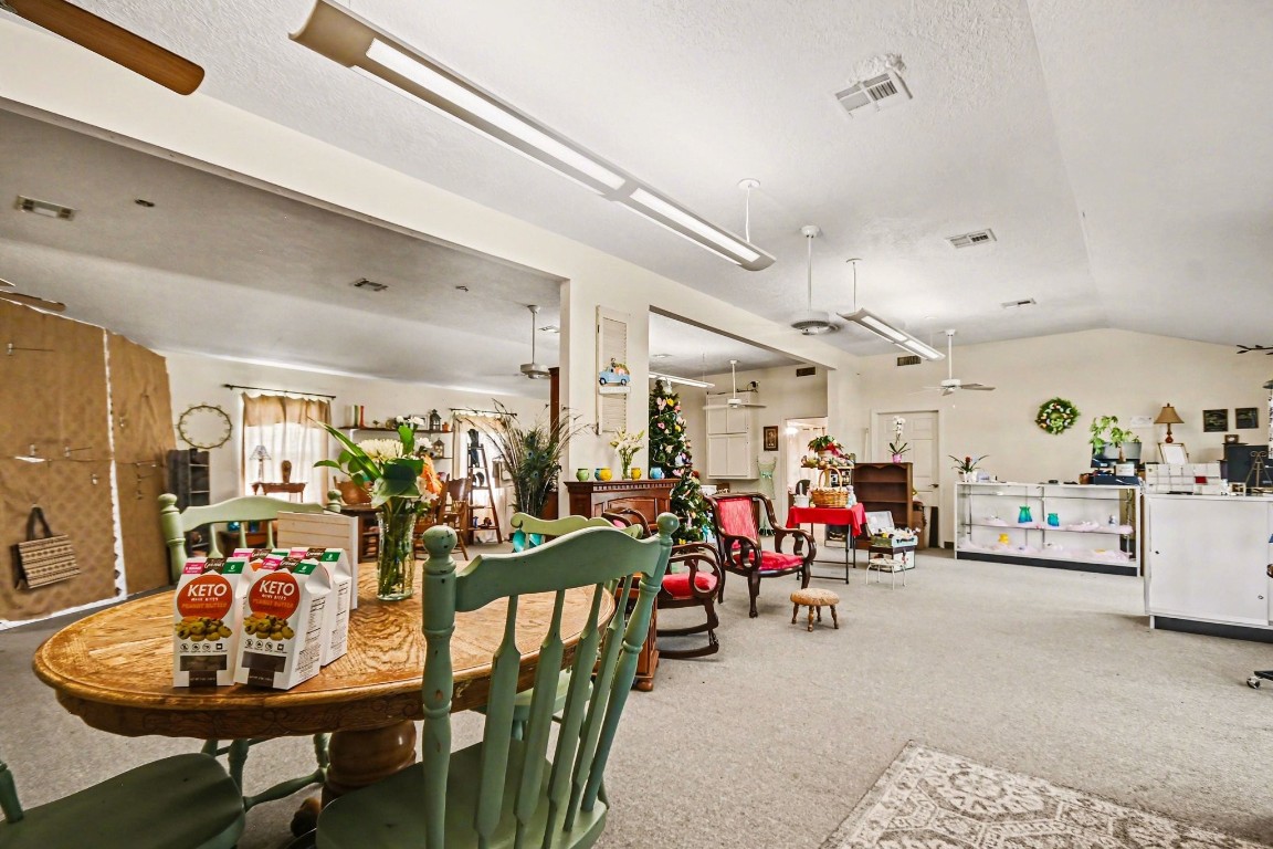 810 Miller Street Anahuac, TX 77514 - Photo 13 of 28 a view of a dining room with furniture