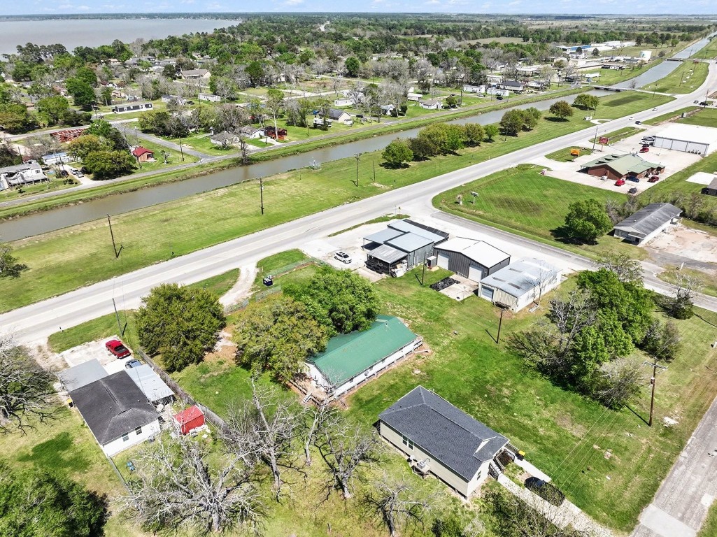 810 Miller Street Anahuac, TX 77514 - Photo 2 of 28 an aerial view of residential houses with outdoor space
