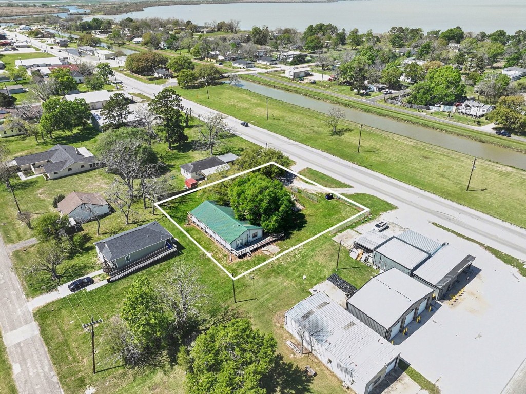 810 Miller Street Anahuac, TX 77514 - Photo 25 of 28 an aerial view of a residential houses with outdoor space and street view