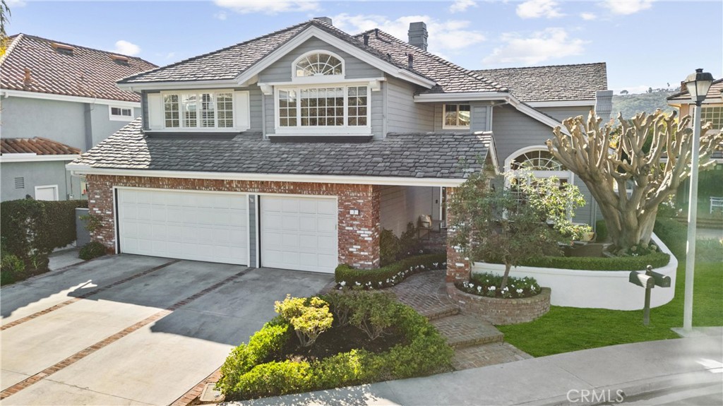 7 Bridington Laguna Niguel, CA 92677 - Photo 1 of 1 a front view of a house with garden