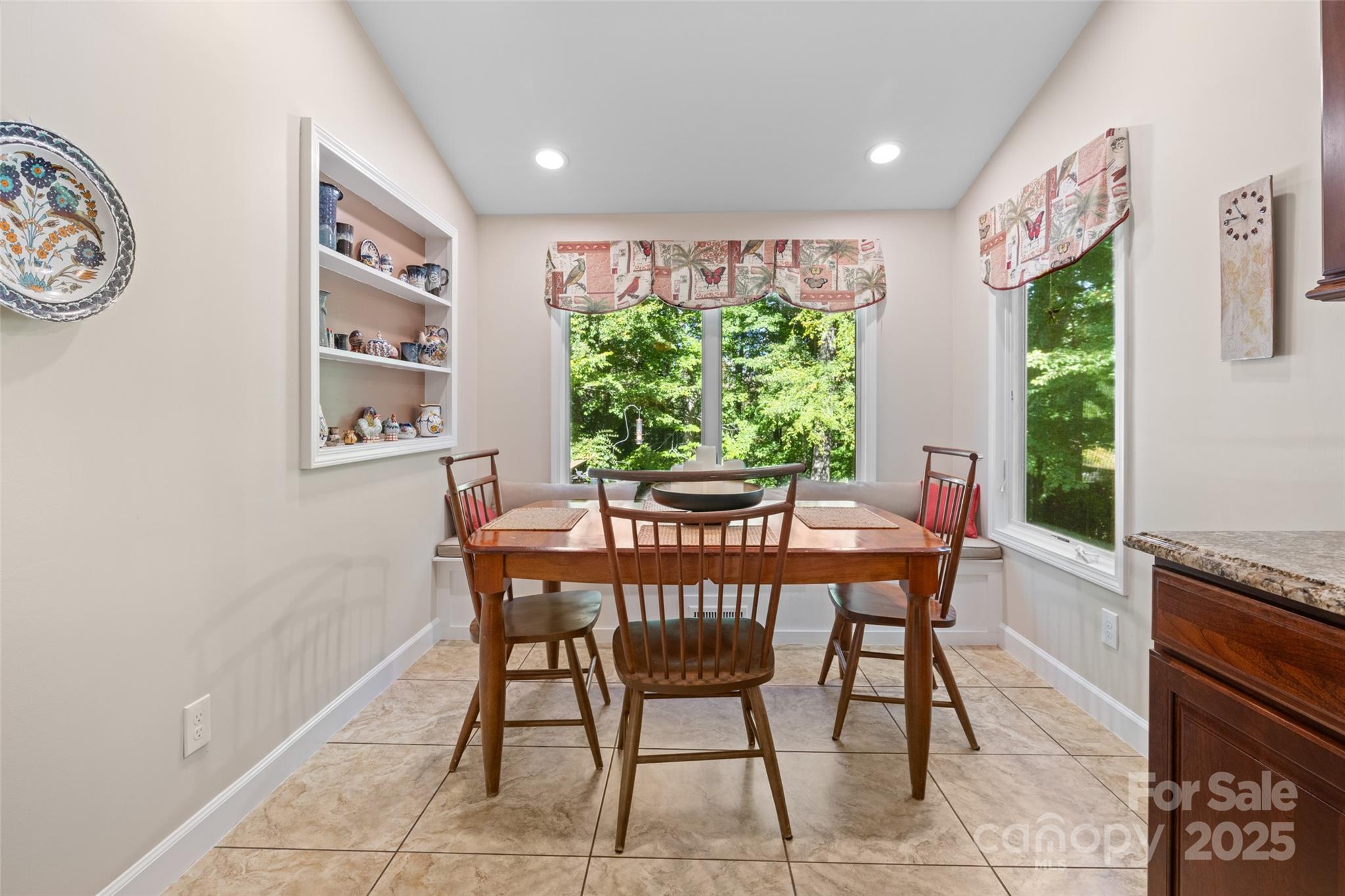 1326 Clifflure Lane Fort Mill, SC 29708 - Photo 19 of 47 a dining room with furniture and a window