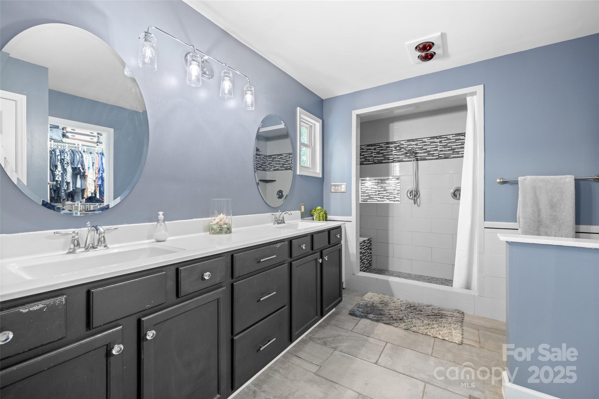 1326 Clifflure Lane Fort Mill, SC 29708 - Photo 22 of 47 a spacious bathroom with a double vanity sink mirror and double
