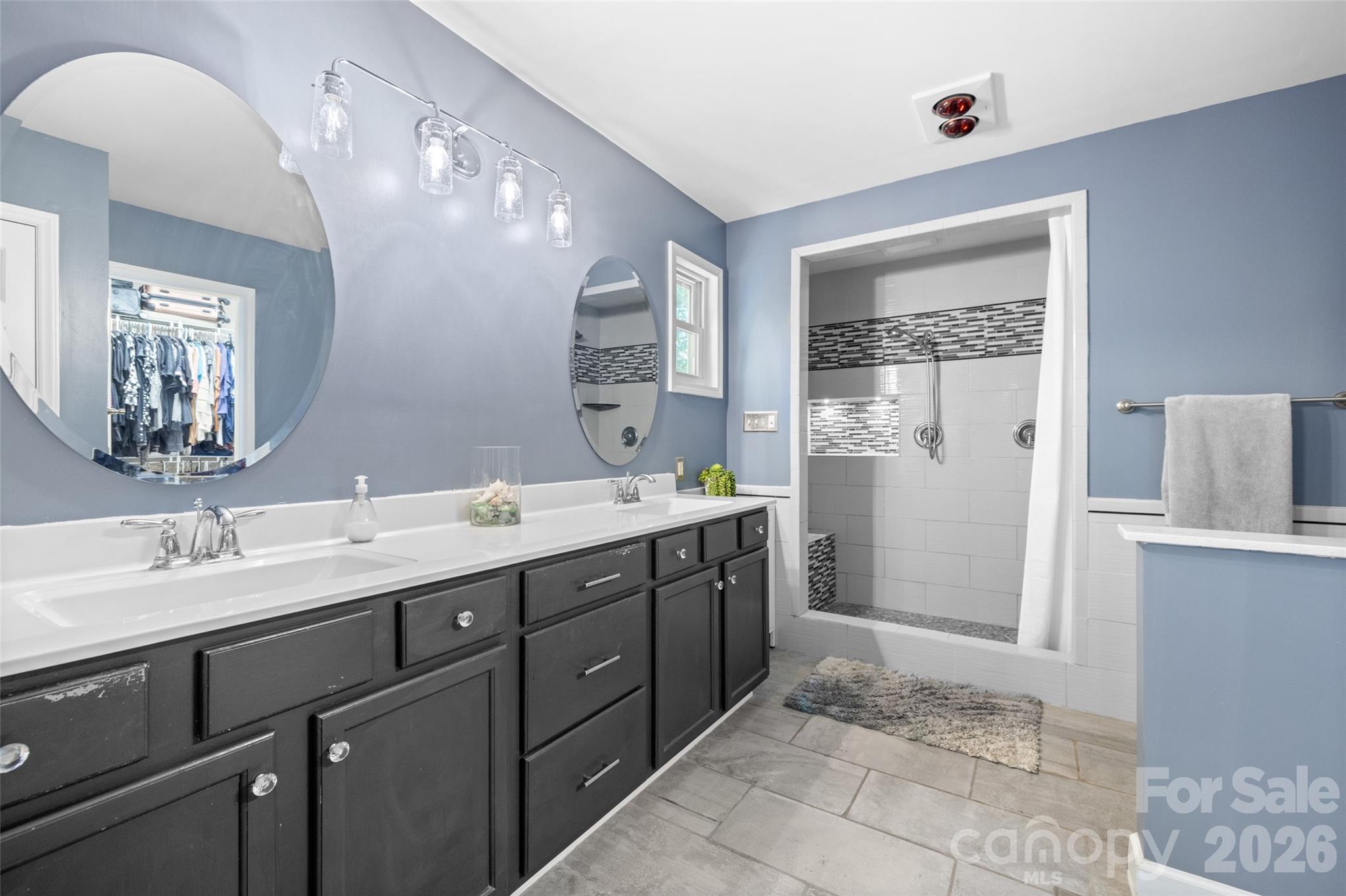 1326 Clifflure Lane Fort Mill, SC 29708 - Photo 22 of 46 a spacious bathroom with a double vanity sink mirror and double