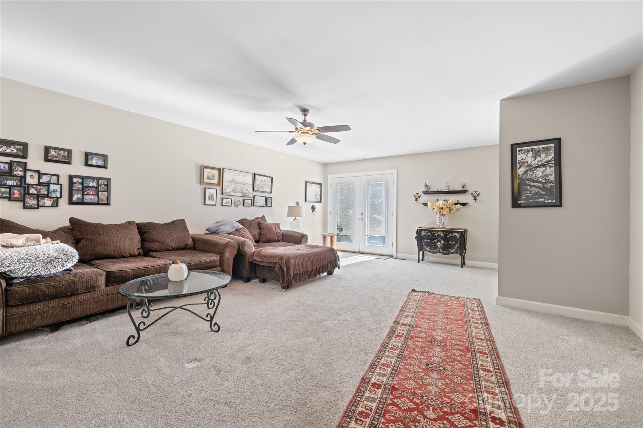 1326 Clifflure Lane Fort Mill, SC 29708 - Photo 25 of 47 a living room with furniture and a rug