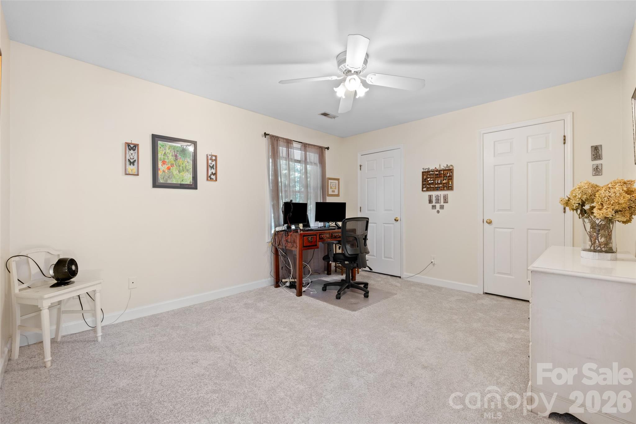 1326 Clifflure Lane Fort Mill, SC 29708 - Photo 30 of 46 a living room with furniture and a chandelier