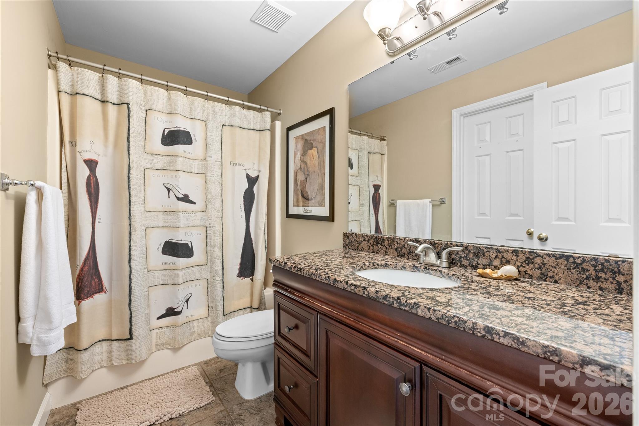 1326 Clifflure Lane Fort Mill, SC 29708 - Photo 31 of 46 a bathroom with a granite countertop sink toilet and shower