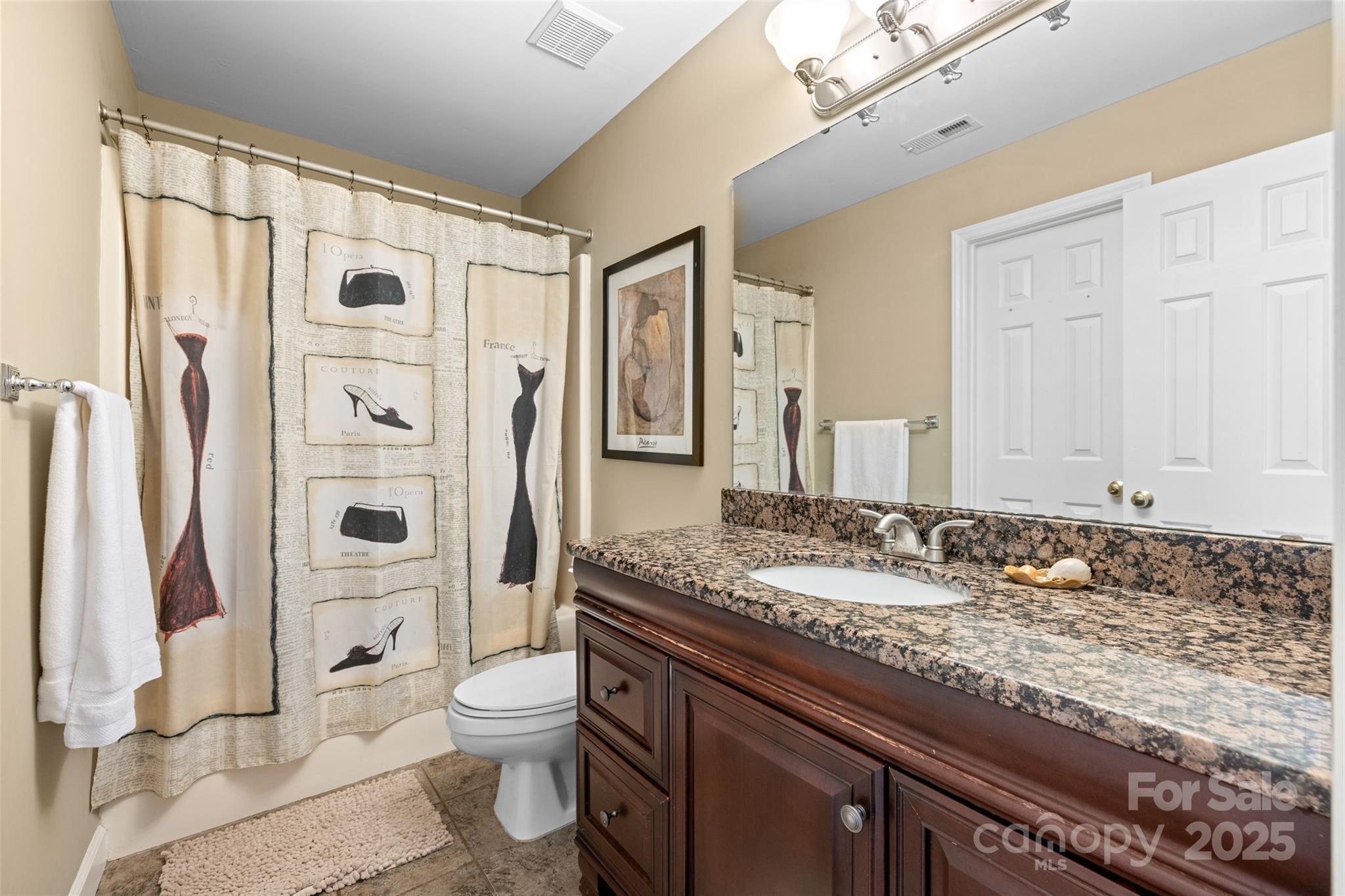 1326 Clifflure Lane Fort Mill, SC 29708 - Photo 31 of 47 a bathroom with a granite countertop sink toilet and shower