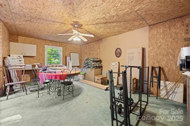 a view of dining room and hall with furniture