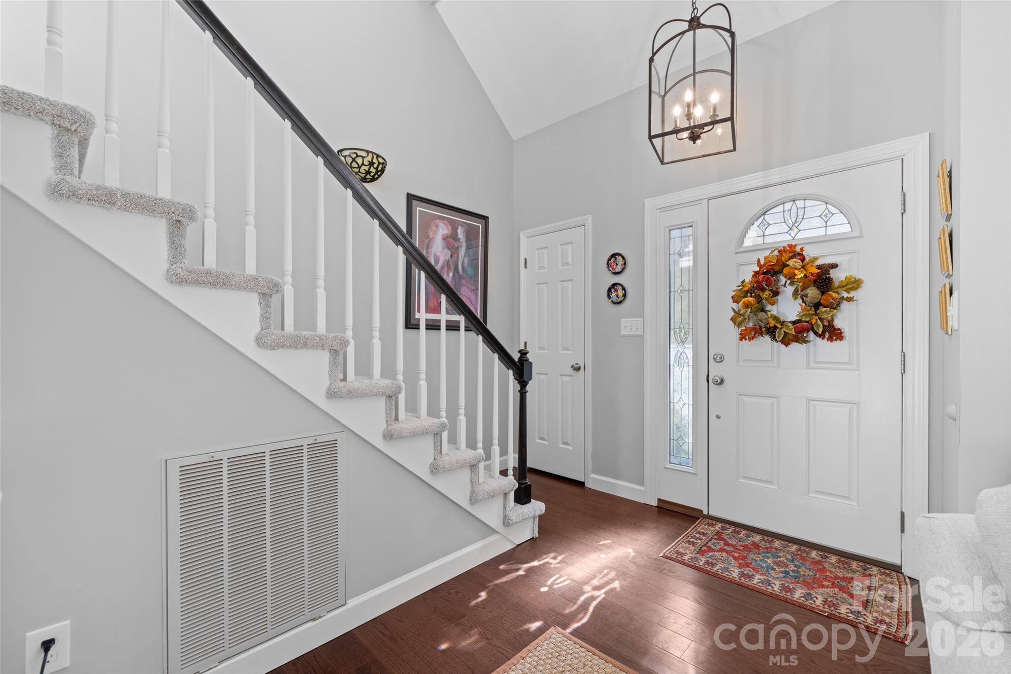 1326 Clifflure Lane Fort Mill, SC 29708 - Photo 4 of 46 a view of entryway and hall with wooden floor